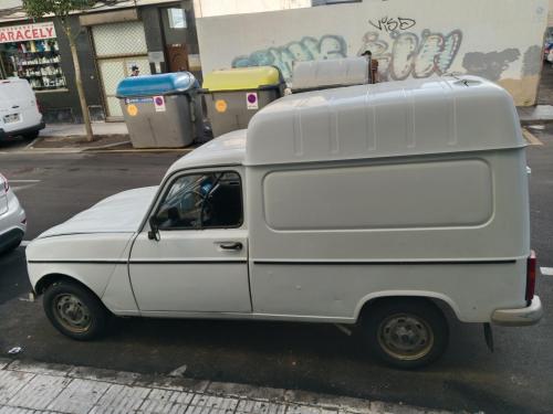 a white van parked on the side of a street at Vamos A La Playa De Fuerteventura in Corralejo