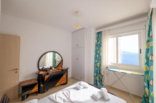 Tempat tidur dalam kamar di Anna Apartament