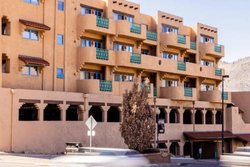 a large building with balconies on the side of it at Golden Sanctuary Luxe Apt 1 Block From Main St in Golden