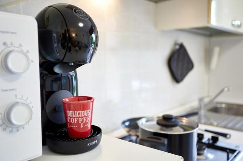 Dapur atau dapur kecil di Rifugio accogliente e sereno con Giardino Privato
