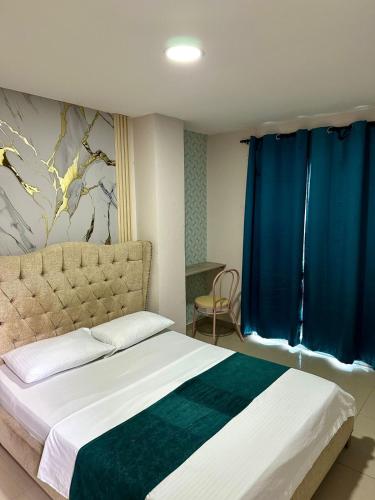 Postel nebo postele na pokoji v ubytování Hotel GRAND H RODADERO