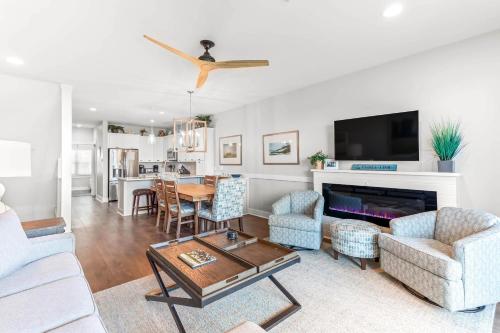 a living room with a couch and a table at Atlantic Ocean 2 in Tybee Island