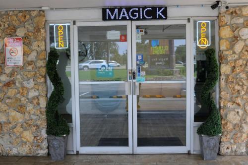 an entrance to a magick store with doors open at Magic Key - Near Disney in Kissimmee