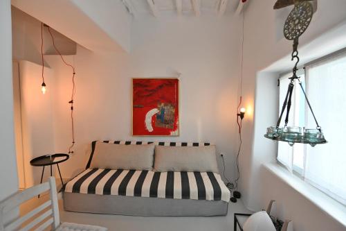 En eller flere senge i et værelse på Kariki Green Triantaros Tinos