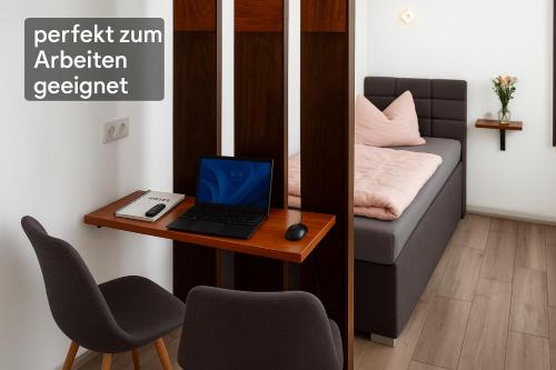 Postel nebo postele na pokoji v ubytování Zum Obstler - Gaststätte und Pension