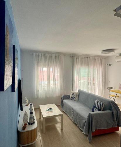 Ένα ή περισσότερα κρεβάτια σε δωμάτιο στο Petit Paradís