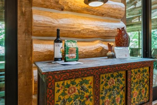 a table with two bottles of wine on it at Wilder Woods in Michiana