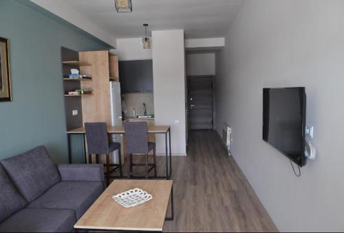 TV a/nebo společenská místnost v ubytování Sweet Home