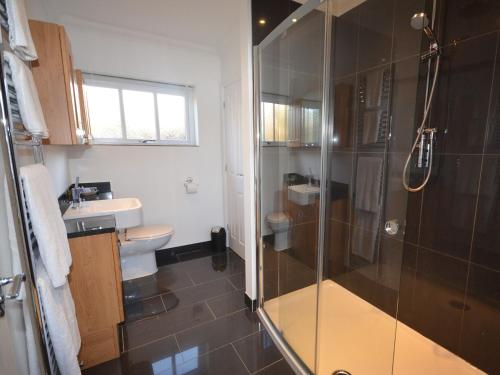 a bathroom with a shower and a sink at 1 Bed in Portreath HAMIB in Redruth