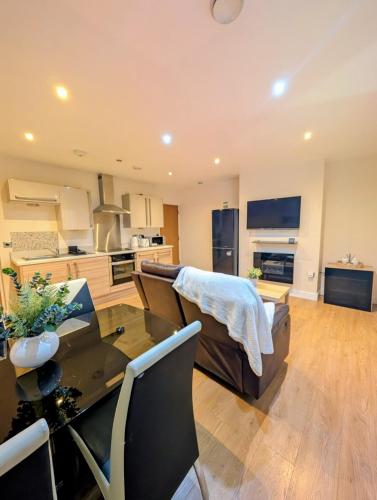 Η κουζίνα ή μικρή κουζίνα στο West Yorkshire Apartment
