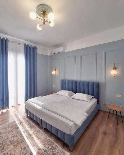 Ένα ή περισσότερα κρεβάτια σε δωμάτιο στο Villa Mishel