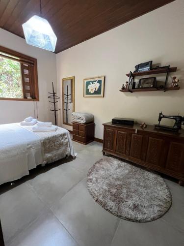 Ένα ή περισσότερα κρεβάτια σε δωμάτιο στο Casa das Hortências