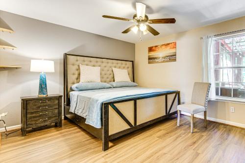 a bedroom with a bed and a ceiling fan at 4 Mi to FSU Family Home with Pool and Yard in Tallahassee