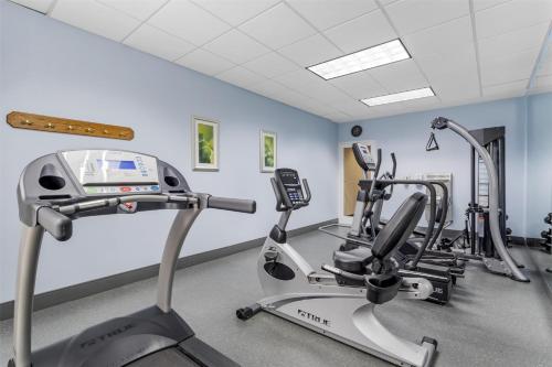 a gym with two tread machines in a room at Best Western Plus River Escape Sylva / Dillsboro in Dillsboro