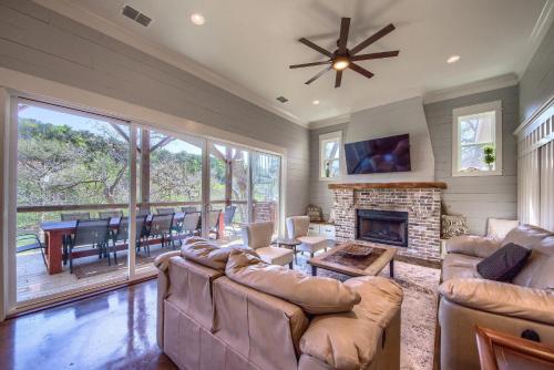 a living room with a couch and a fireplace at RR 7134 River Repose in Canyon Lake