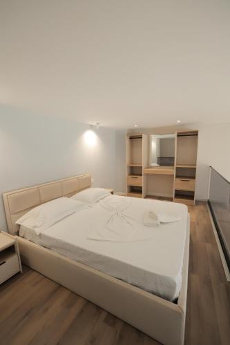 Ліжко або ліжка в номері Duplex City