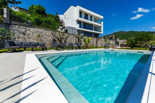 Villa K Opatija with a heated pool, gym, sauna, astonishing sea view