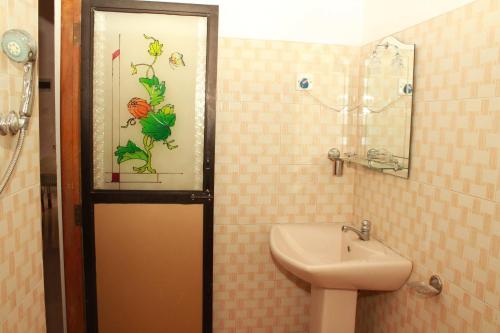 Een badkamer bij Miringa homestay