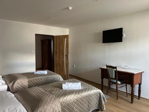 Postel nebo postele na pokoji v ubytování Hotel Zámek Letohrad