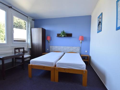 Chalet in Dolní Brusnice near Ski Liftにあるベッド