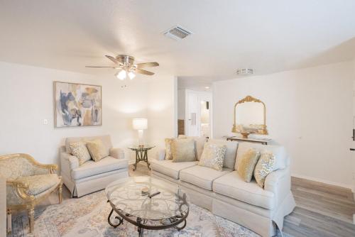 a living room with a couch and a table at 4-BD 3-FullBA SAMedical Cen,Riverwalk,Fiesta,Rodeo in San Antonio