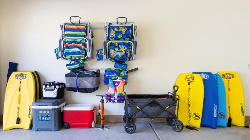 a group of suitcases and bags hanging on a wall at ❤PiH❤ Mauna Kea SunsetsOcean and Golf ViewsOptional Mauna Kea Hotel Privileges in Hapuna Beach