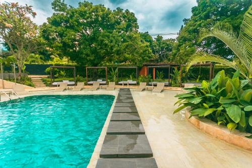 Bazén v ubytování Del Tropico hotel nebo v jeho okolí