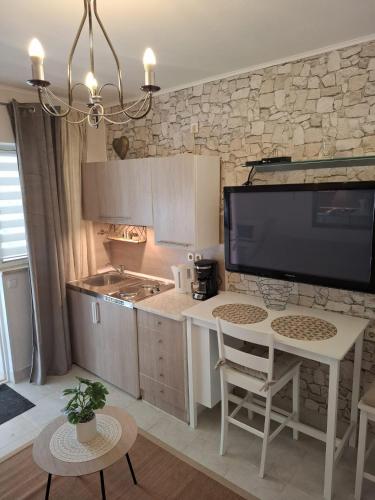 Kuchyň nebo kuchyňský kout v ubytování Royal Apartments Sandra