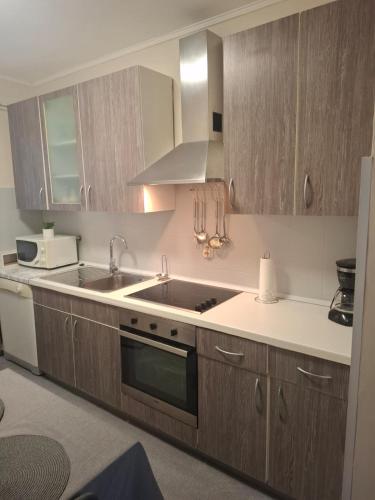 Kuchyň nebo kuchyňský kout v ubytování Royal Apartments Sandra