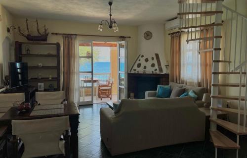 Et opholdsområde på Kohyli Beachfront House