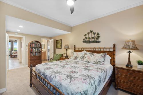 a bedroom with a large bed in a room at Kahana Village 31 · KHV 31 Spacious Direct Oceanfront 3BD Condo in Kahana