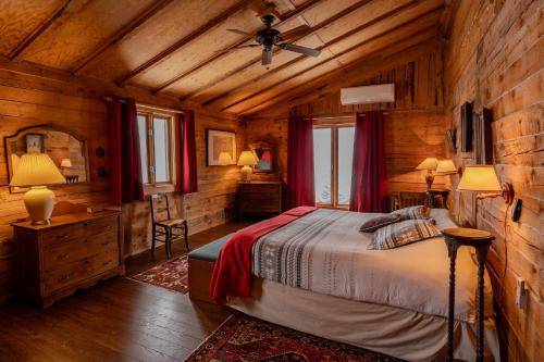 Ένα ή περισσότερα κρεβάτια σε δωμάτιο στο Auberge Cap au Leste