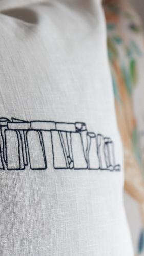 a close up of the word home on a white shirt at Fairlawn House in Amesbury