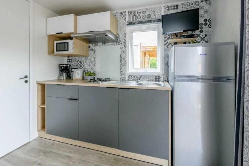 Photo de la galerie de l'établissement Camping 4 étoiles - Piscine - eebif0, à Parentis-en-Born