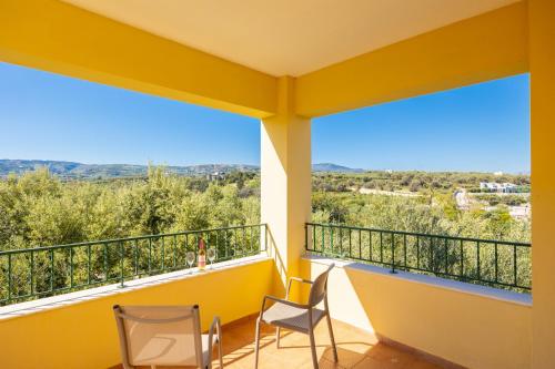 Балкон или терраса в Villa Eleni Helios