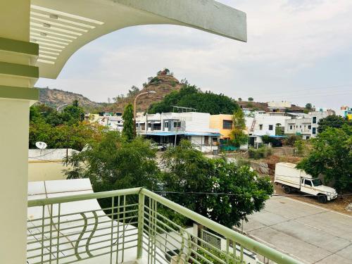 a view of a city from a balcony at Private & Elegant 3BHK villa, Hillside Hideaway, 10 mins from MH Bus Stand in Aurangabad
