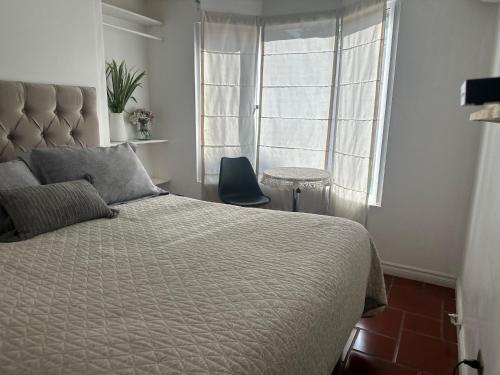 Ένα ή περισσότερα κρεβάτια σε δωμάτιο στο Casa Fuerteventura