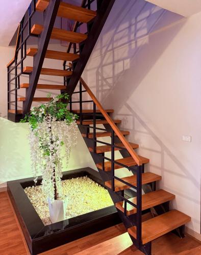 a stairwell with a planter in the floor at Mirage residence resort in Cairo