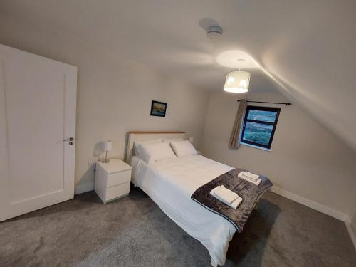 Una cama o camas en una habitación de Croi An Locha