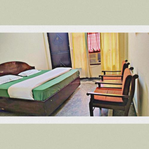 Katil atau katil-katil dalam bilik di Nancy Paradise Hotel