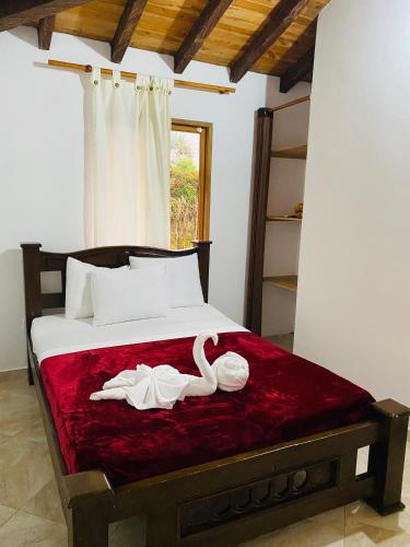 Llit o llits en una habitació de Hotel Estaciones