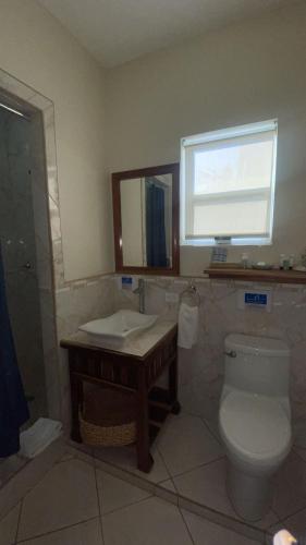 Bilik mandi di Sea Horizon Hotel