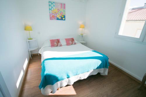 Le Grand Large Bord de Mer Hotel & Appartementsにあるベッド