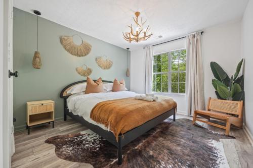 Ένα ή περισσότερα κρεβάτια σε δωμάτιο στο 6BD-3BA Designer Oasis - Sleeps 14 - ATL Metro