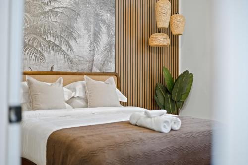 Ένα ή περισσότερα κρεβάτια σε δωμάτιο στο 6BD-3BA Designer Oasis - Sleeps 14 - ATL Metro