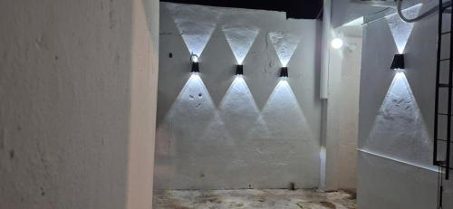 a glass door with a window with snow on it at Habitación compartida en el Centro de Cancún in Cancún