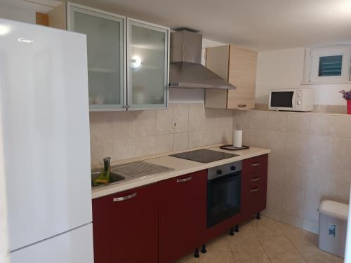 Kuchyň nebo kuchyňský kout v ubytování Apartments with parking spaces Marina, Trogir - 11554
