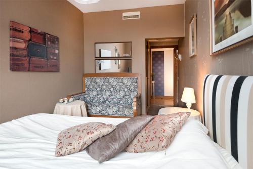 Postel nebo postele na pokoji v ubytování Hotell Aina