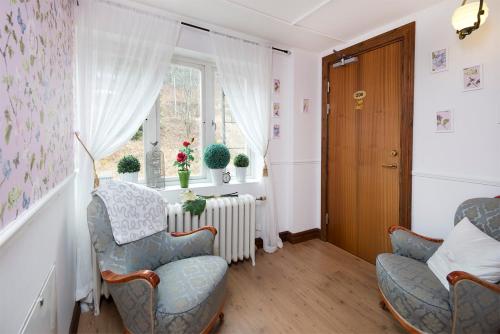 Posezení v ubytování Hotell Aina