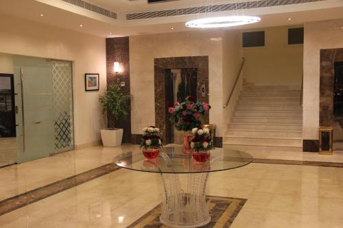 Lobbyen eller receptionen på Le Park Shaqra